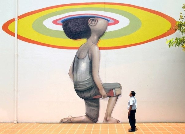 Парижский уличный художник Жульен  Сет” Малланд рисует причудливые фрески по всему миру